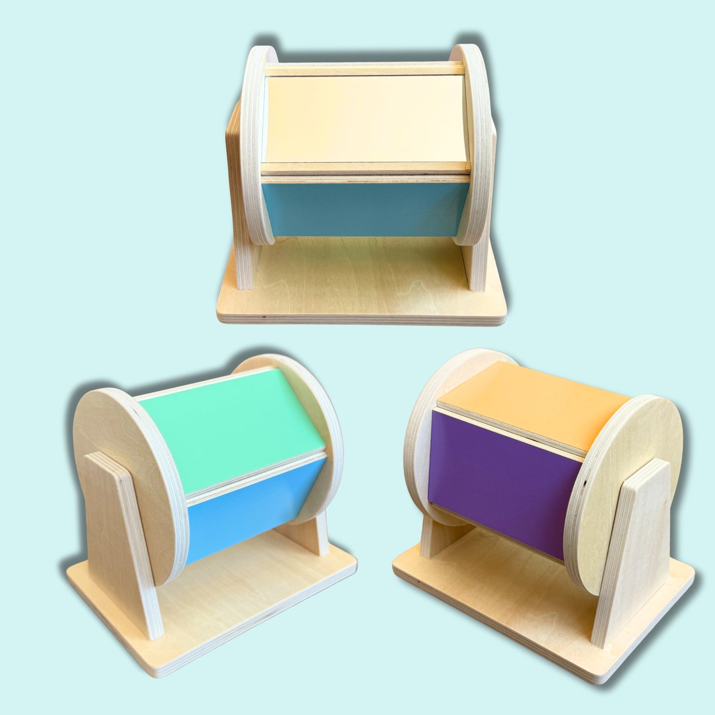 Montessori wooden spinning drum in pastel colours for tummy time play, hand eye coordination, motor skill development and visual stimulation – Babyroos 6–12 month developmental toy