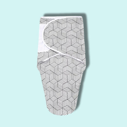 Adjustable newborn swaddle wrap in black and white geometric print with soft Velcro fasteners – Babyroos sleeping essential for 0–3 months
