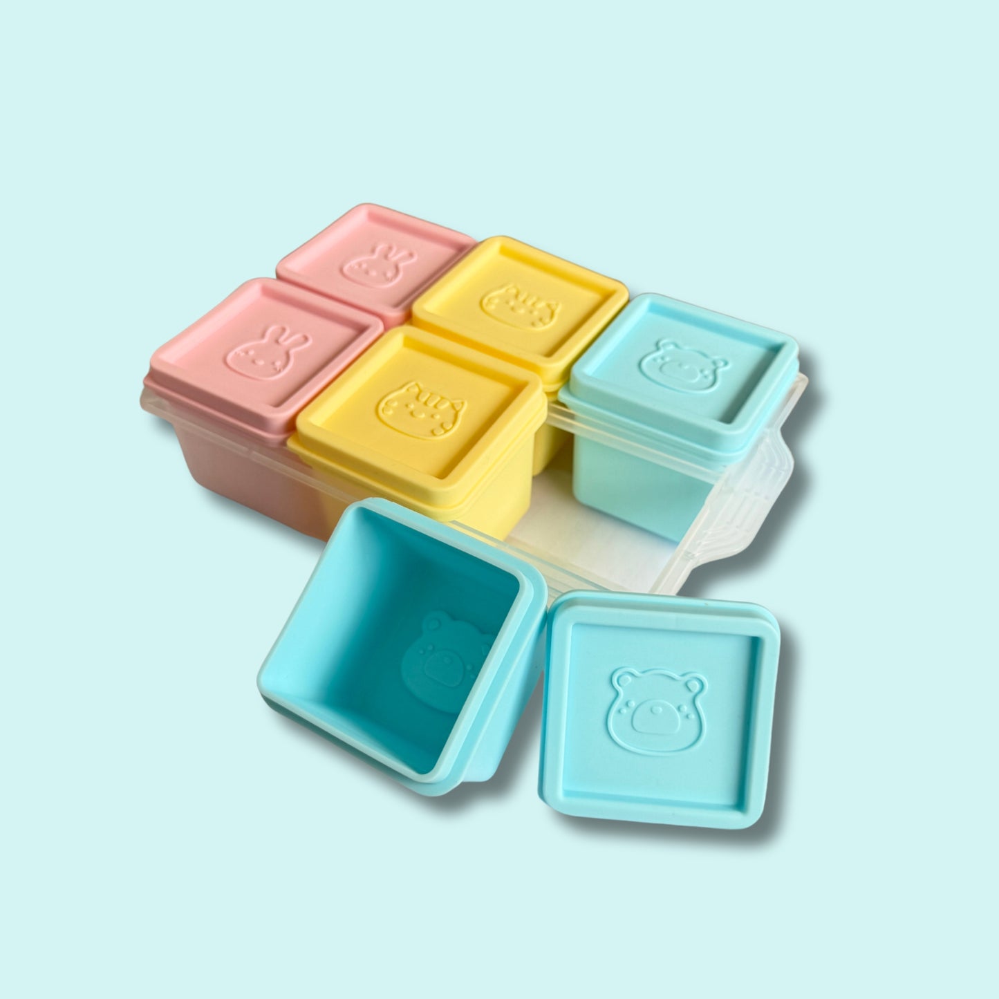 Set of six pastel silicone baby food storage containers with animal face lids – Babyroos freezer-safe pods for solids and snacks