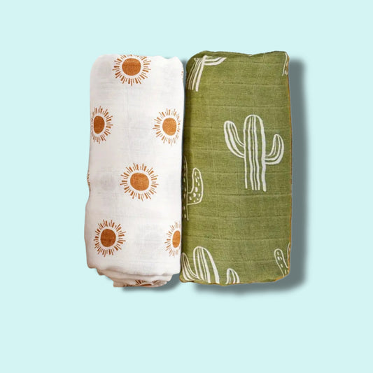 Set of two soft muslin baby wraps with sun and cactus prints in earthy tones – Babyroos breathable swaddles for newborn comfort